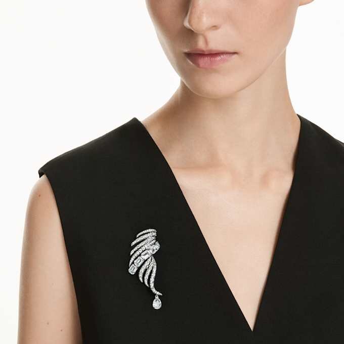 Broche « Feather » de la collection Vienna, blanche, plaquée ruthénium Broche « Feather » de la collection Vienna, blanche, plaquée ruthénium