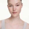 Collier Una Angelic, motifs double face à taille ronde, blanc, plaqué rhodium Collier Una Angelic, motifs double face à taille ronde, blanc, plaqué rhodium