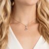 Pendentif cygne, rose, plaqué or rose Pendentif cygne, rose, plaqué or rose